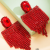 Aretes banderolas de borlas rojo