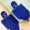 Aretes banderolas de borlas azul