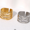 Anillo hilos entrelazados