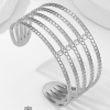 Cuff bandas de acero cruzado